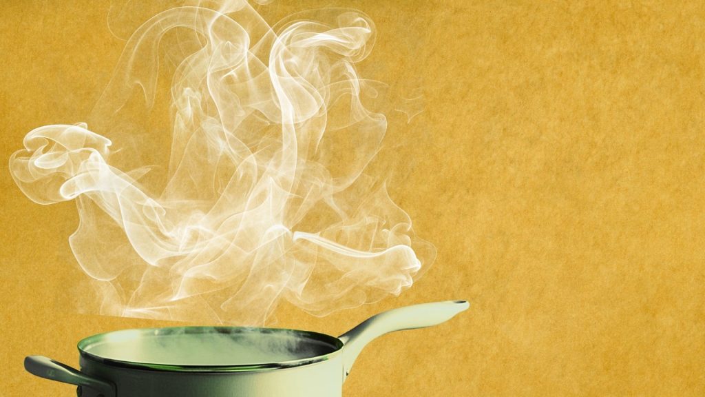 Dampfender Kochtopf als Symbol für definierte Zentren im Human Design und ihre beständige Wirkung.